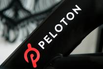 This Nov. 19, 2019 file photo shows a Peloton logo on the company's stationary bicycle in San F ...