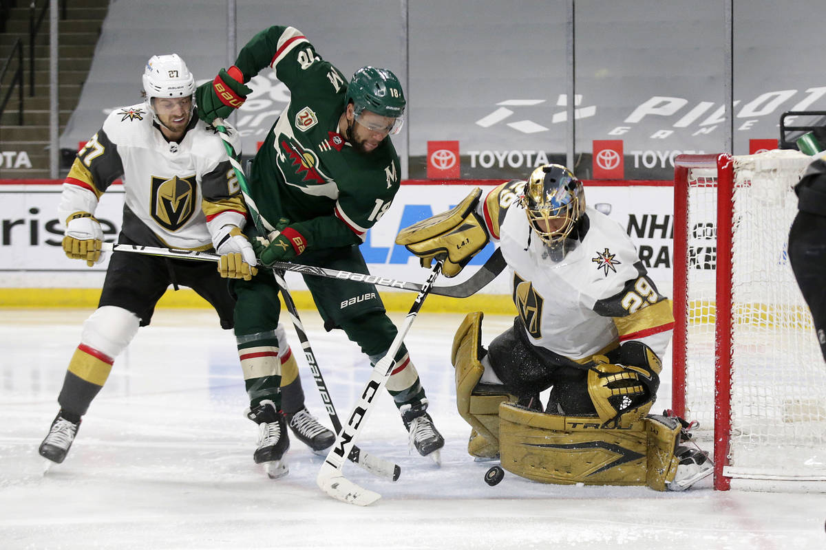 Vegas Golden Knights goaltender Marc-Andre Fleury (29) blocks a shot by Minnesota Wild left win ...