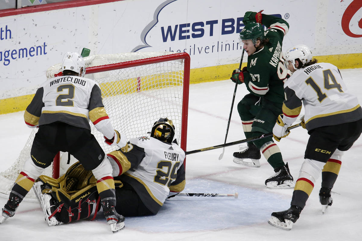 Minnesota Wild left wing Kirill Kaprizov (97) scores a goal on Vegas Golden Knights goaltender ...