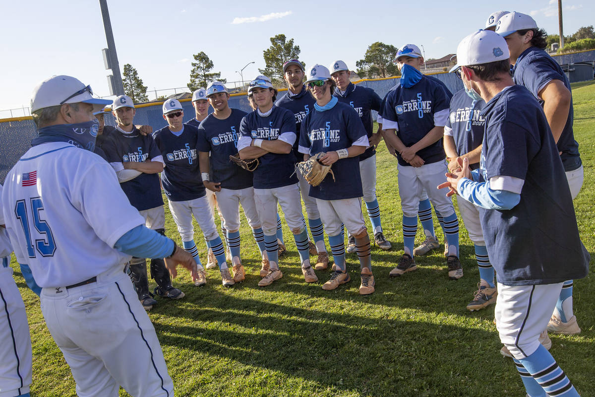 Centennial High School's baseball coach Charlie Cerrone gives a speech to his team after winnin ...