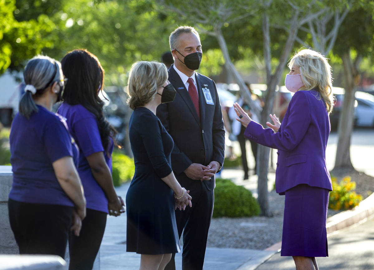 First Lady Jill Biden, from right, is greeted by University Medical Center CEO Mason Van Houwel ...