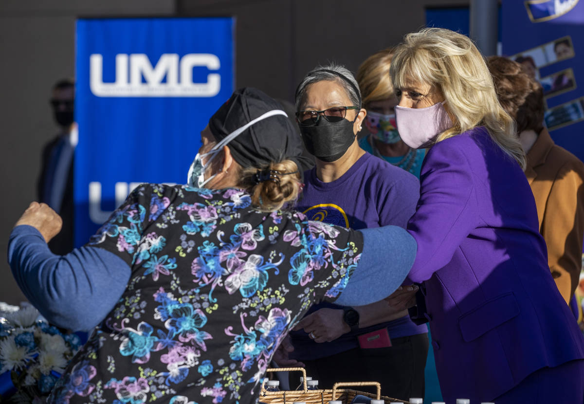 First Lady Jill Biden shares an elbow bump with a nurse at the University Medical Center while ...