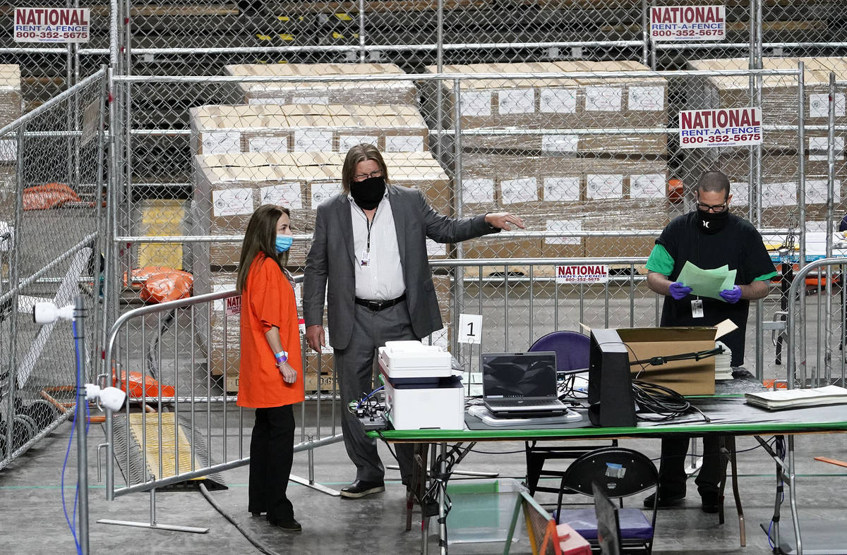 Maricopa County ballots cast in the 2020 general election are being examined and recounted by c ...