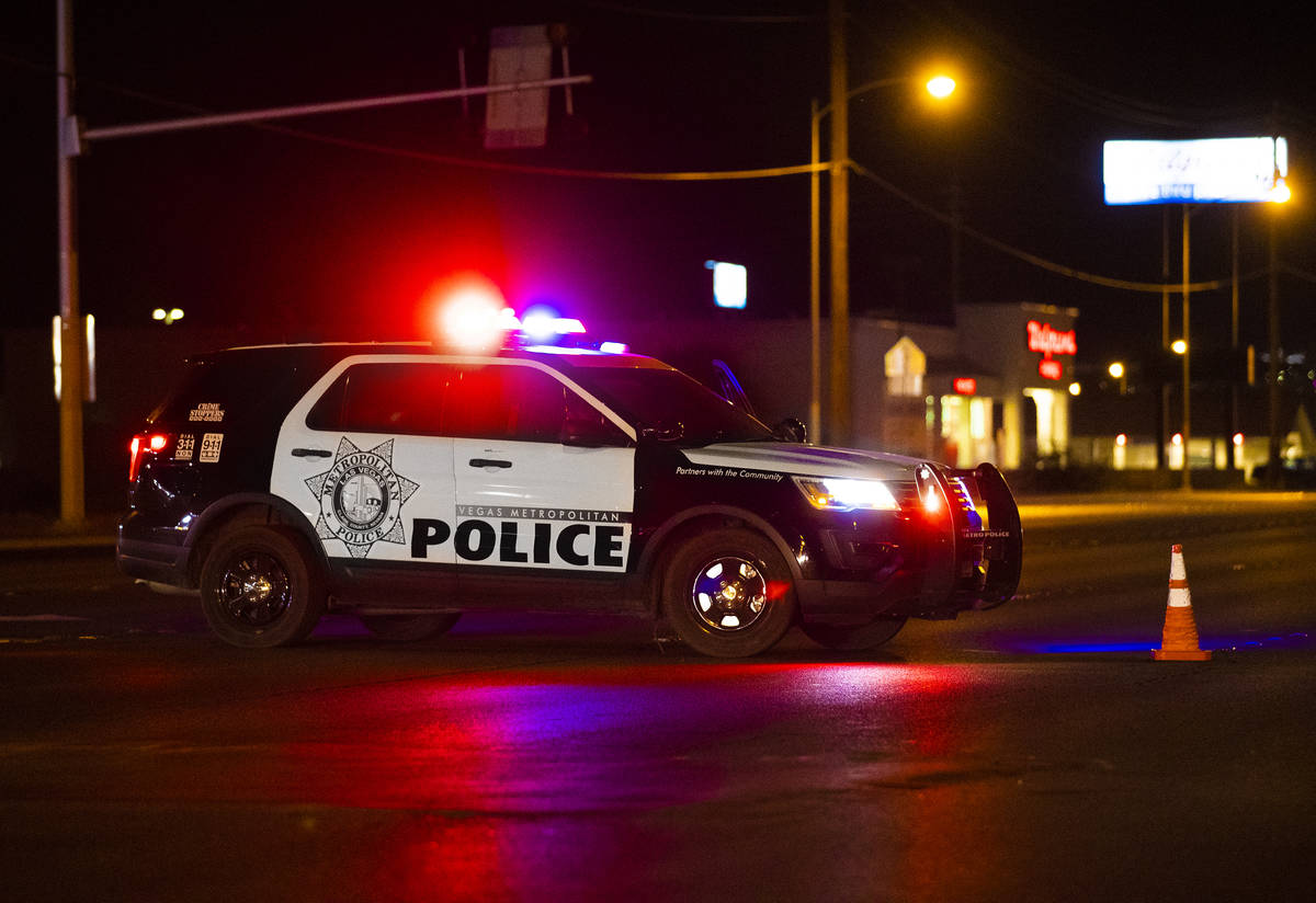 Officers investigate a fatal hit-and-run crash in northeast Las Vegas close to East Lake Mead B ...