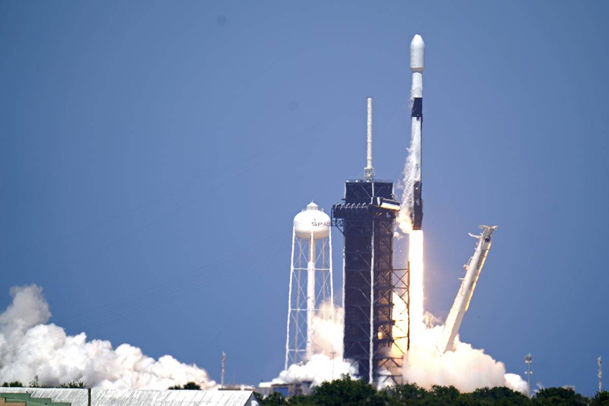 A SpaceX Falcon 9 rocket with the 26th batch of approximately 60 satellites for SpaceX's Starli ...