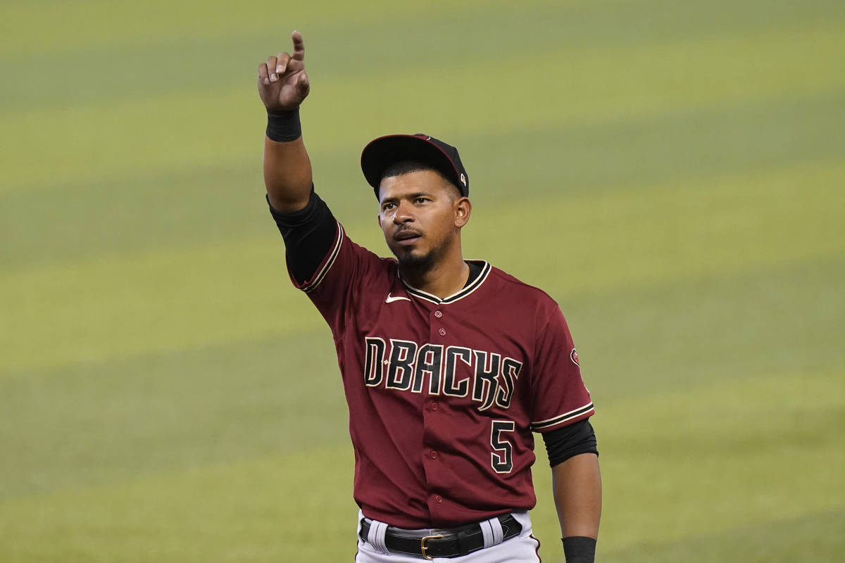 Arizona Diamondbacks' Eduardo Escobar (5) waves before a baseball game against the Miami Marlin ...
