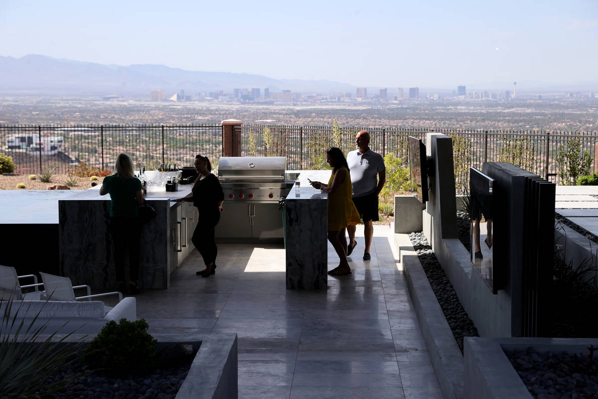 A custom-built home at 681 Dragon Peak Drive in Henderson is shown during a broker preview Thur ...