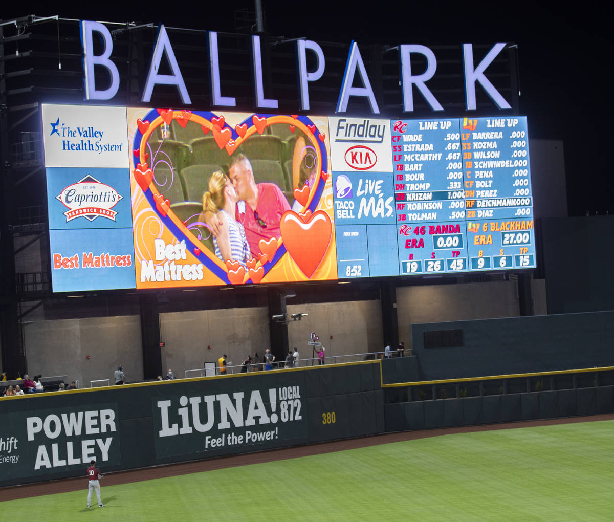 Fans kiss on the kiss cam during a Triple-A baseball game between the Las Vegas Aviators and Sa ...