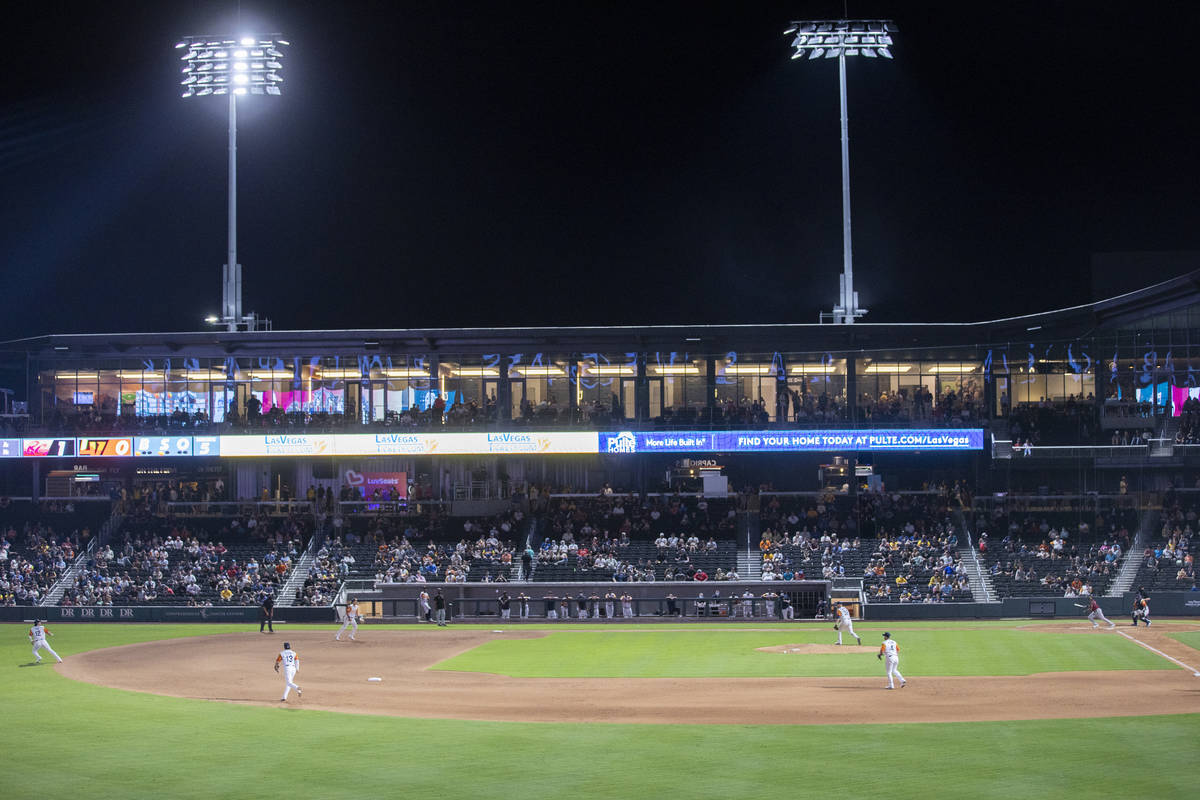 Las Vegas Aviators catcher Carlos P rez (23) chases Sacramento River Cats  infielder Thairo …