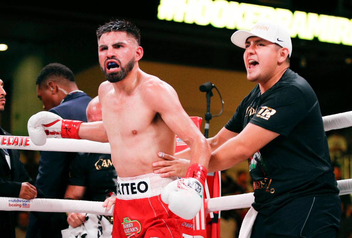 Jose Ramirez celebrates a TKO against Maurice Hooker after six rounds of a boxing match, Saturd ...