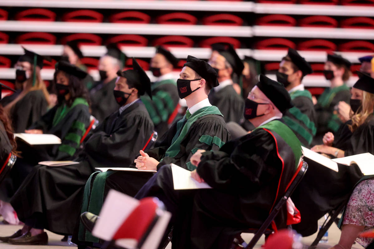 Members of the first graduating class of medical doctor students from the Kirk Kerkorian School ...