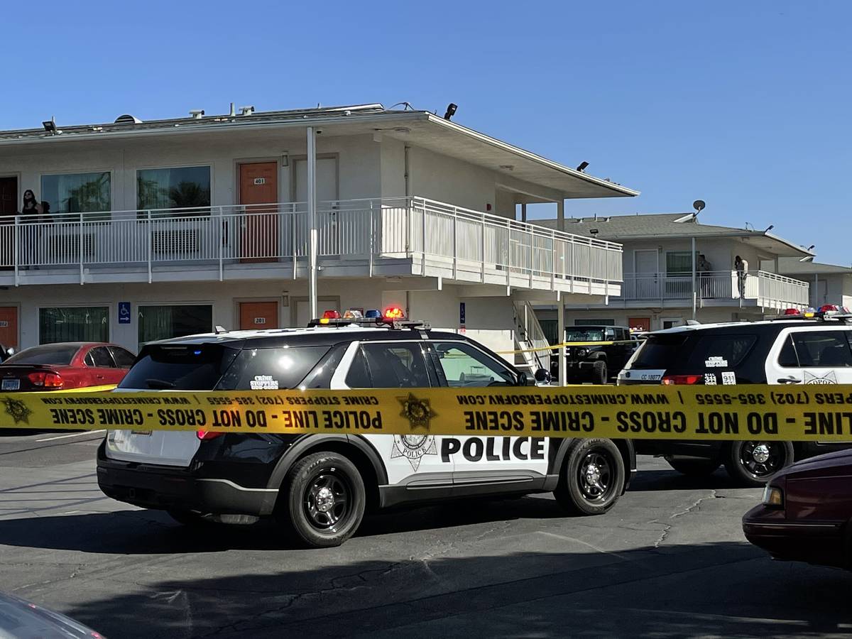 Las Vegas police investigate a homicide around the 100 block of East Tropicana Avenue, near Kov ...