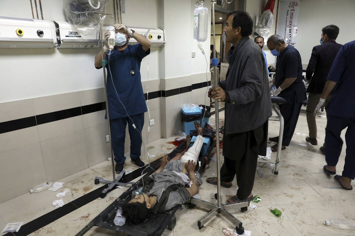 An Afghan school student treated at a hospital after a bomb explosion near a school west of Kab ...