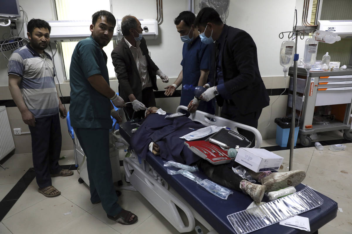 An Afghan school student is treated at a hospital after a bomb explosion near a school west of ...