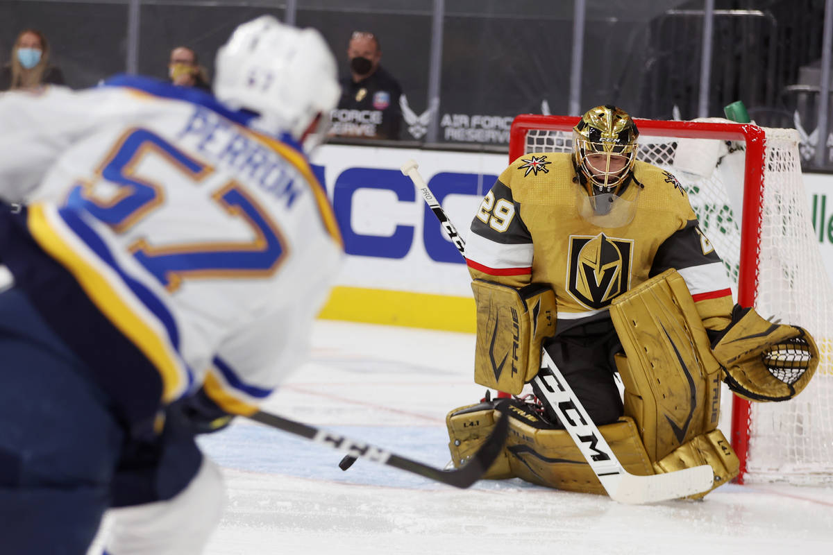 Vegas Golden Knights goaltender Marc-Andre Fleury (29) defends a shot from St. Louis Blues left ...