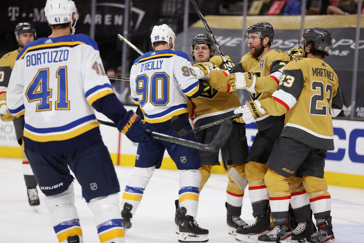 Vegas Golden Knights center Mattias Janmark (26), defenseman Alex Pietrangelo (7) and defensema ...