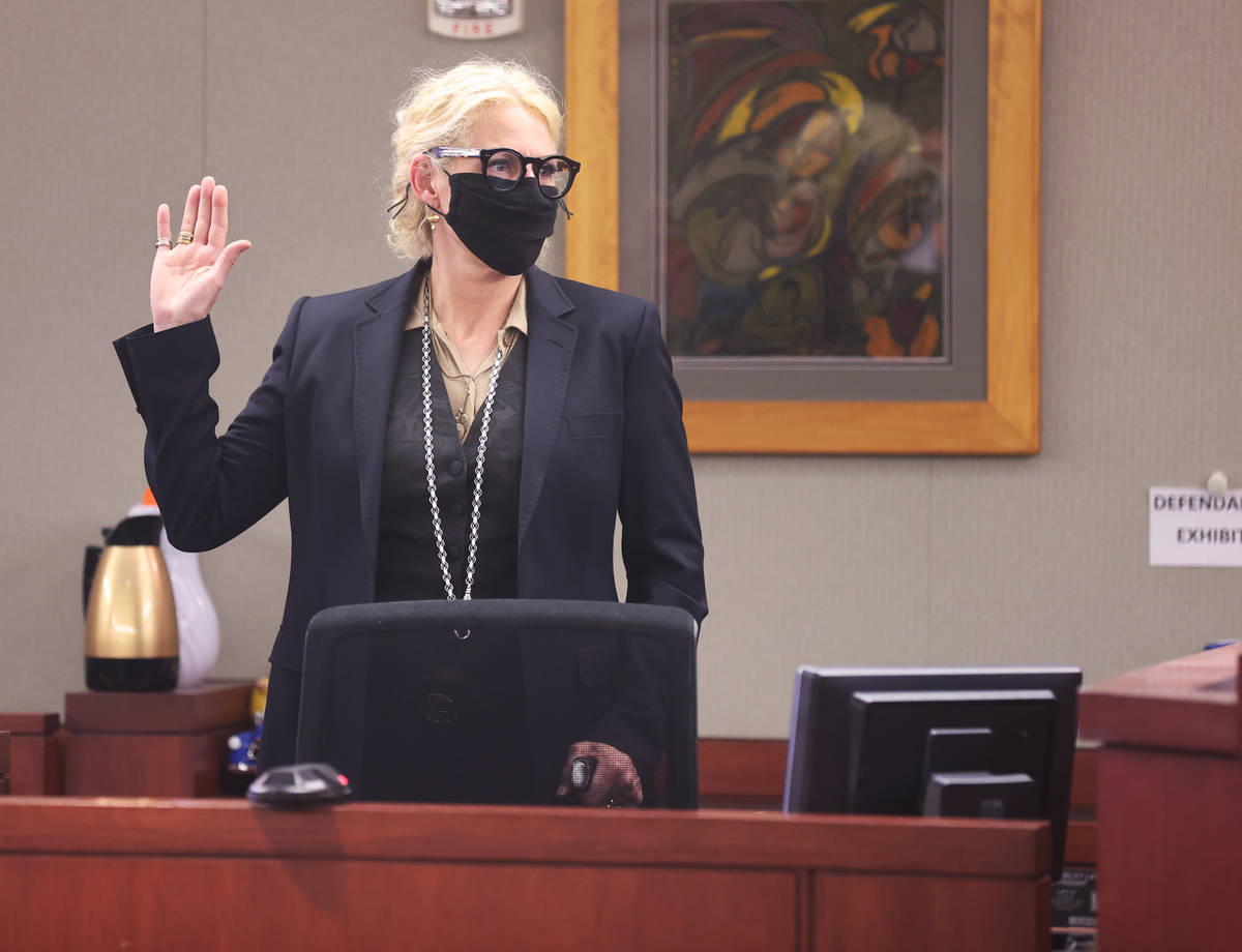 Michelle Dell, owner of Hogs & Heifers, is sworn in before testifying during a civil trial ...
