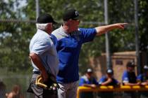 Basic head coach Scott Baker questions the umpire's call during the fourth inning of a game aga ...