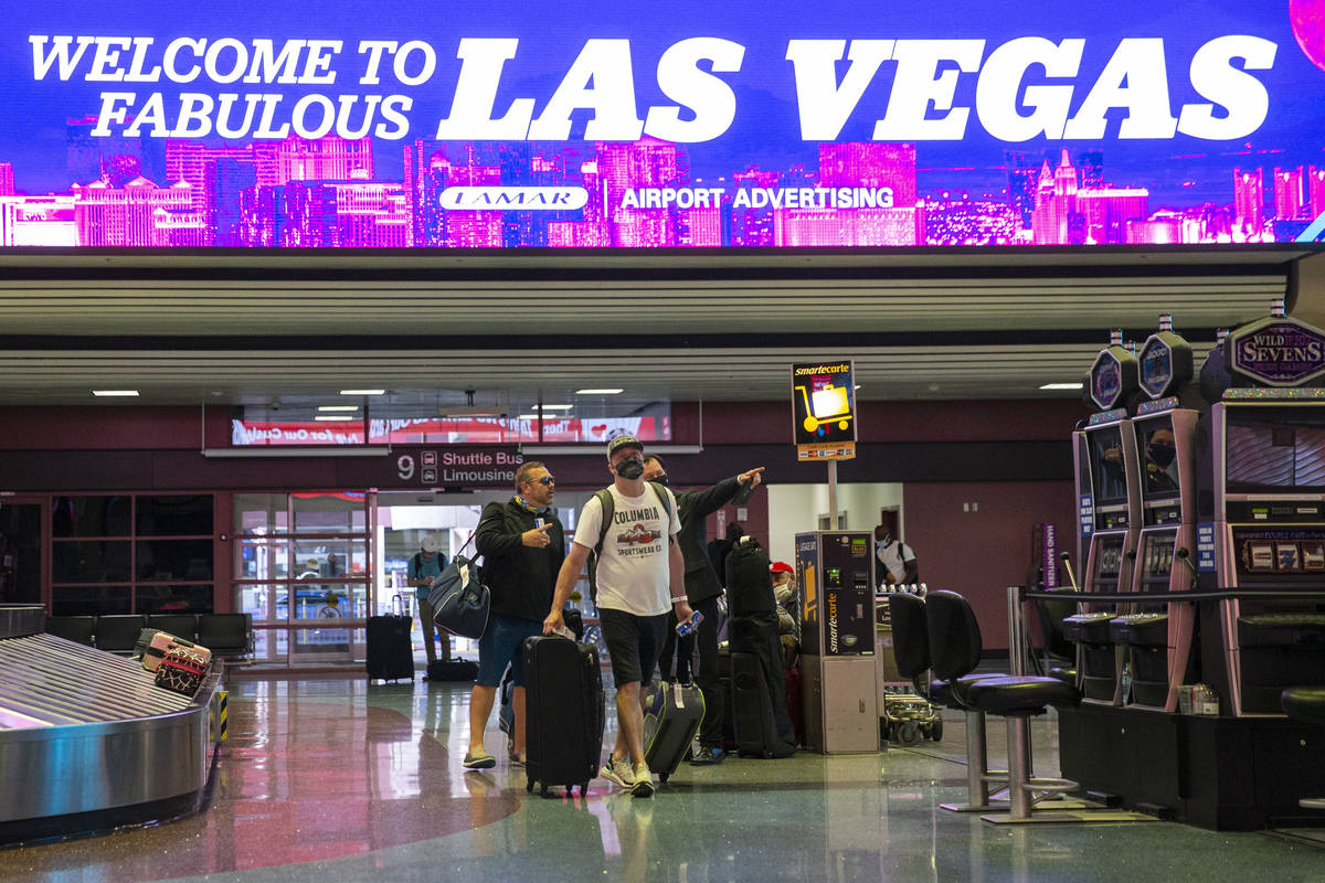 Travelers at McCarran International Airport Terminal 1 in Las Vegas, Thursday, May 13, 2021. (E ...