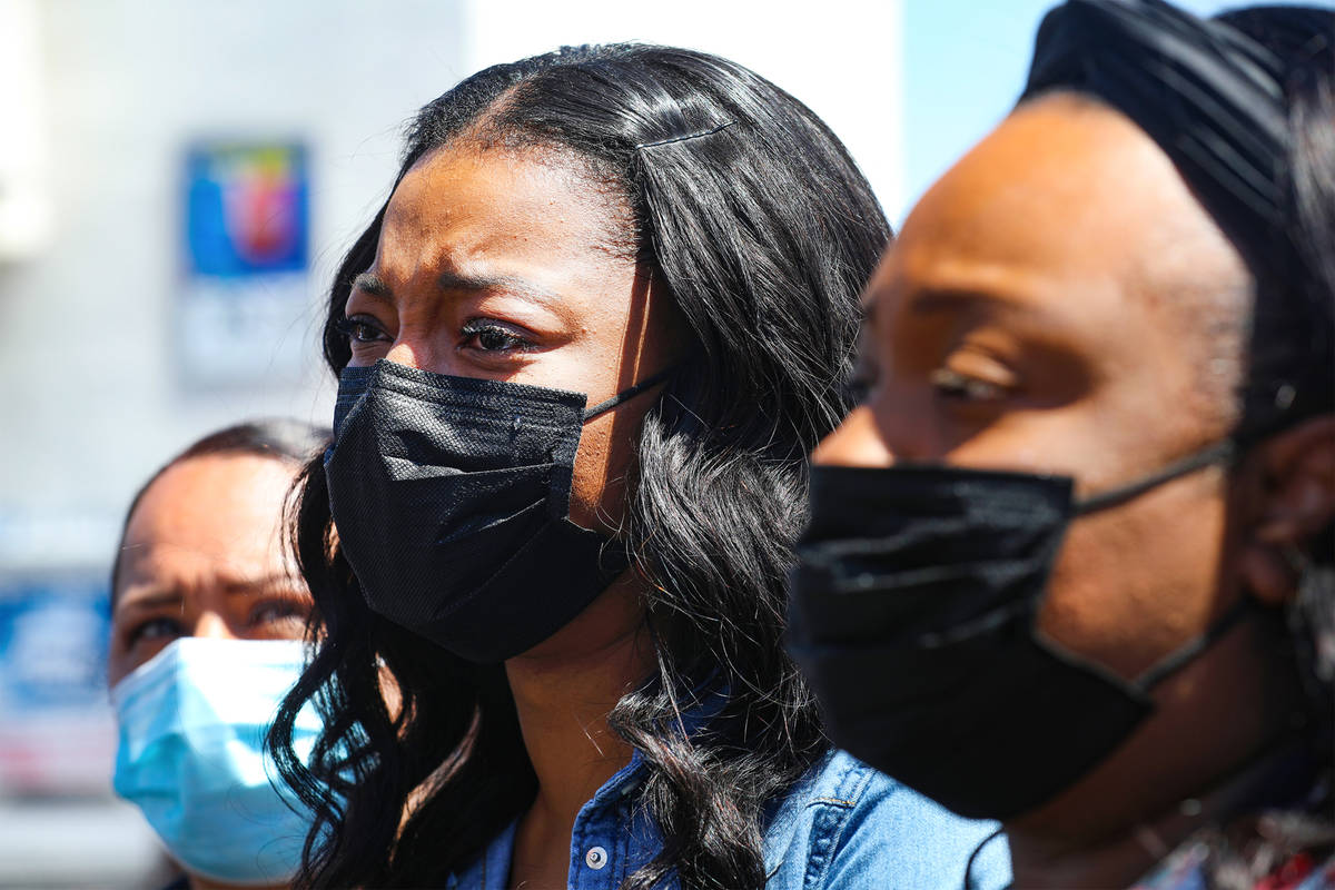 Yolanda Everett, aunt of 2-year-old Amari Nicholson who vanished last week, center, addresses t ...