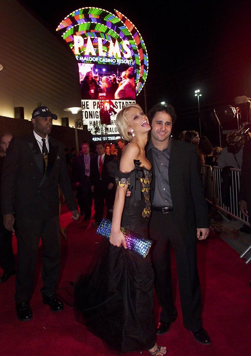 Palms President George Maloof poses with Paris Hilton during the grand opening of the Palms on ...