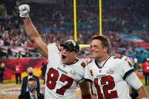 Tampa Bay Buccaneers tight end Rob Gronkowski, left, and quarterback Tom Brady celebrate after ...