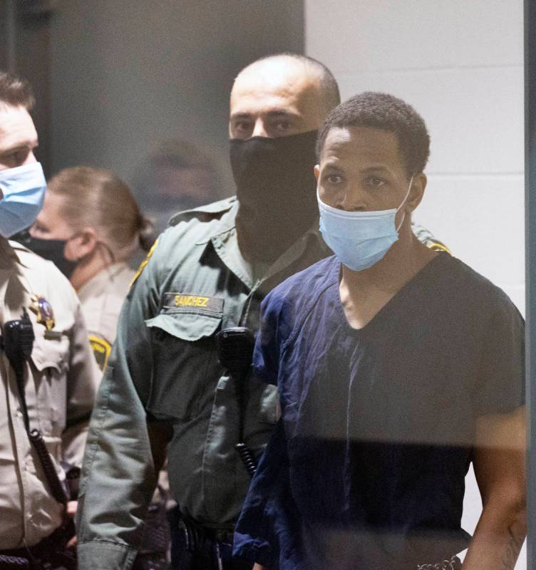Terrell Rhodes, charged in the death of a 2-year-old boy, Amari Nicholson, is led into the cour ...