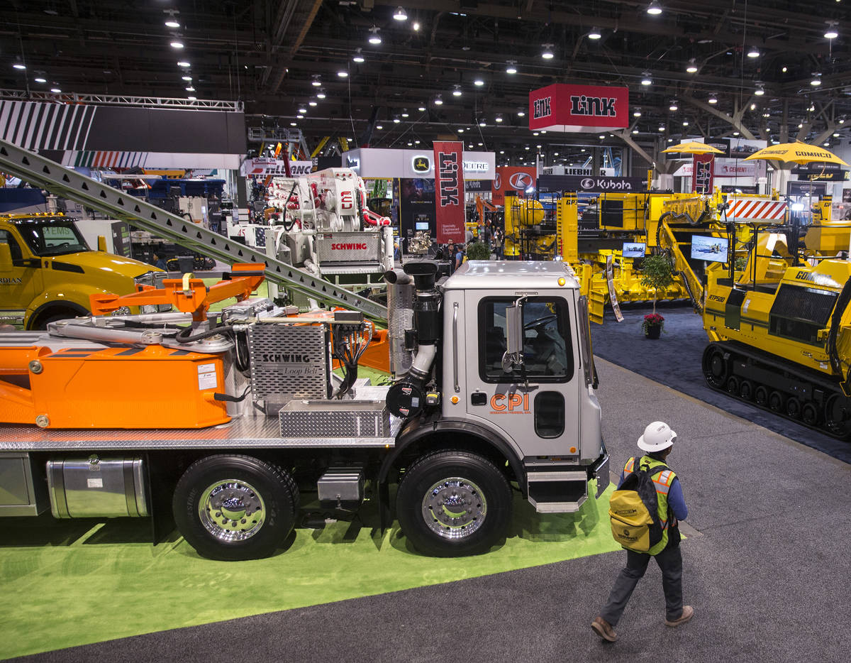 Convention goers explore the Central Hall during the last day of World of Concrete on Friday, J ...