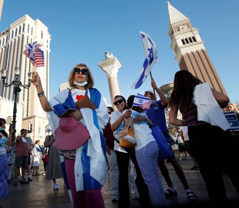 Pro-Israel demonstrators including Chana Meirav Bader of Las Vegas, left, gather outside The Ve ...