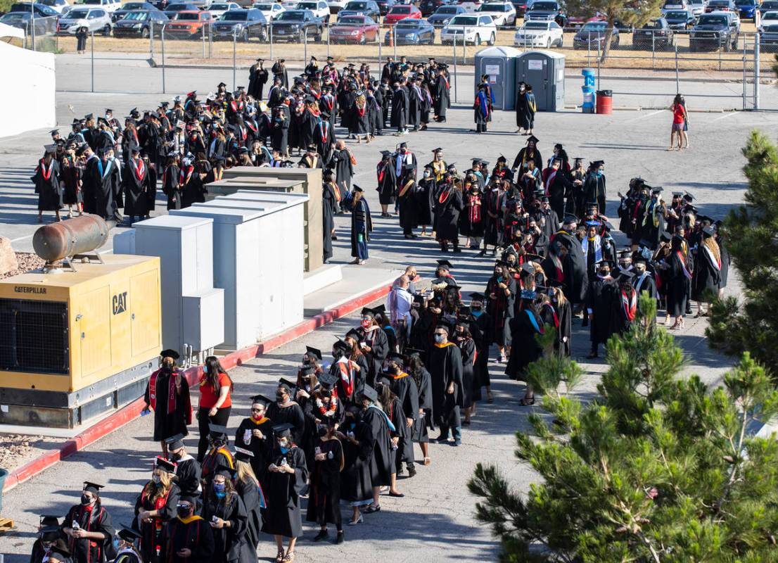 Graduates lined up to attend the first of several UNLV graduation ceremonies at Sam Boyd Stadiu ...