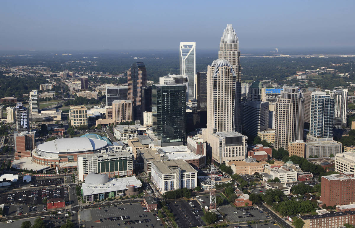 The Time Warner Cable Arena is shown on left of downtown Charlotte, N.C., Thursday, Aug. 16, 20 ...