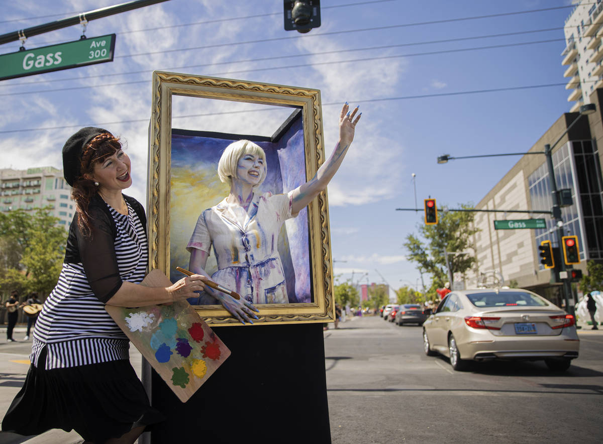Robin Slonina, left, founder and resident artist at Skin City, and model Maddie Hake greet pass ...