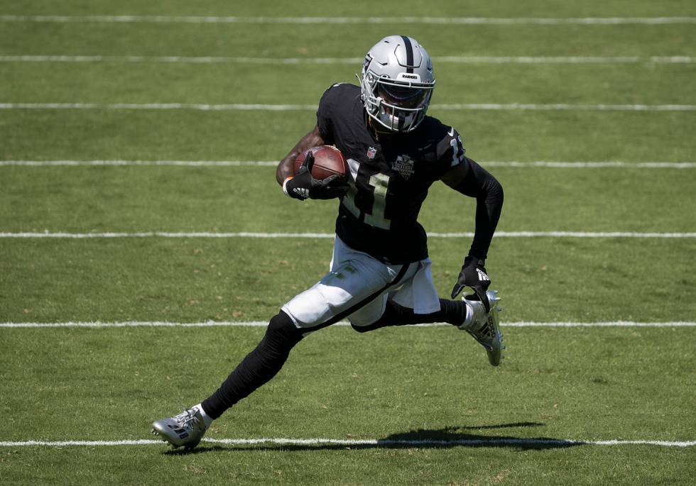 Las Vegas Raiders wide receiver Henry Ruggs III (11) streaks towards the end zone in the first ...