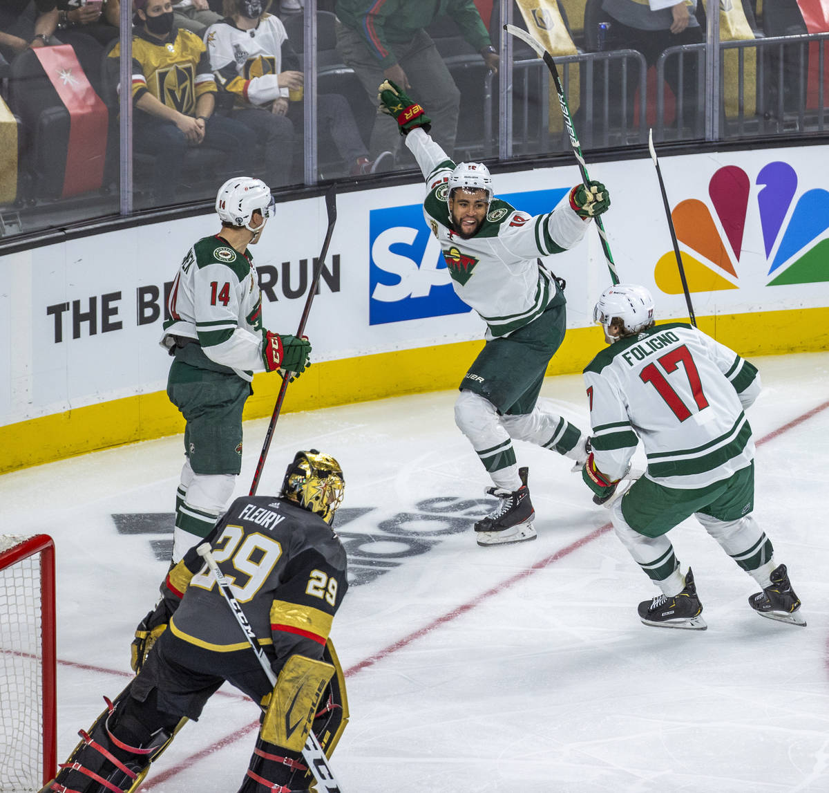 Minnesota Wild center Joel Eriksson Ek (14), celebrates his winning goal with teammates left wi ...