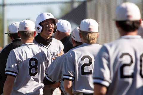 Palo Verde's outfielder Zach Helein (27) celebrates after scoring a run against Bishop Gorman d ...