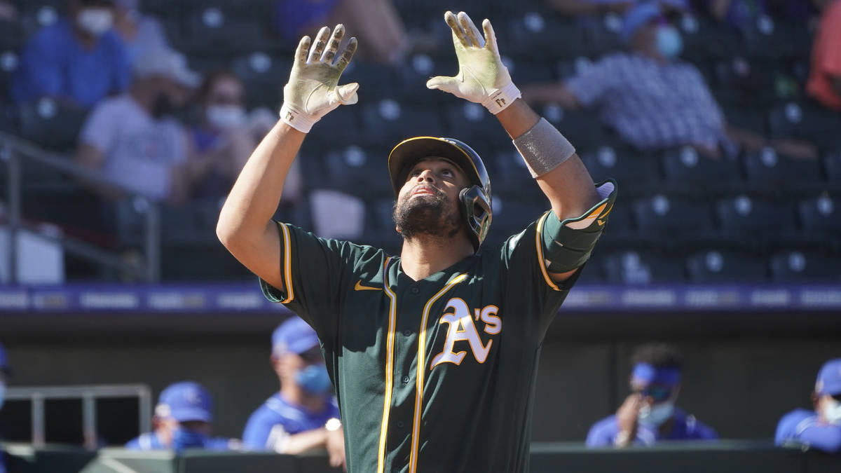Oakland Athletics' Francisco Pena gestures as he crosses the plate with a home run in the sixth ...
