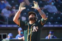 Oakland Athletics' Francisco Pena gestures as he crosses the plate with a home run in the sixth ...