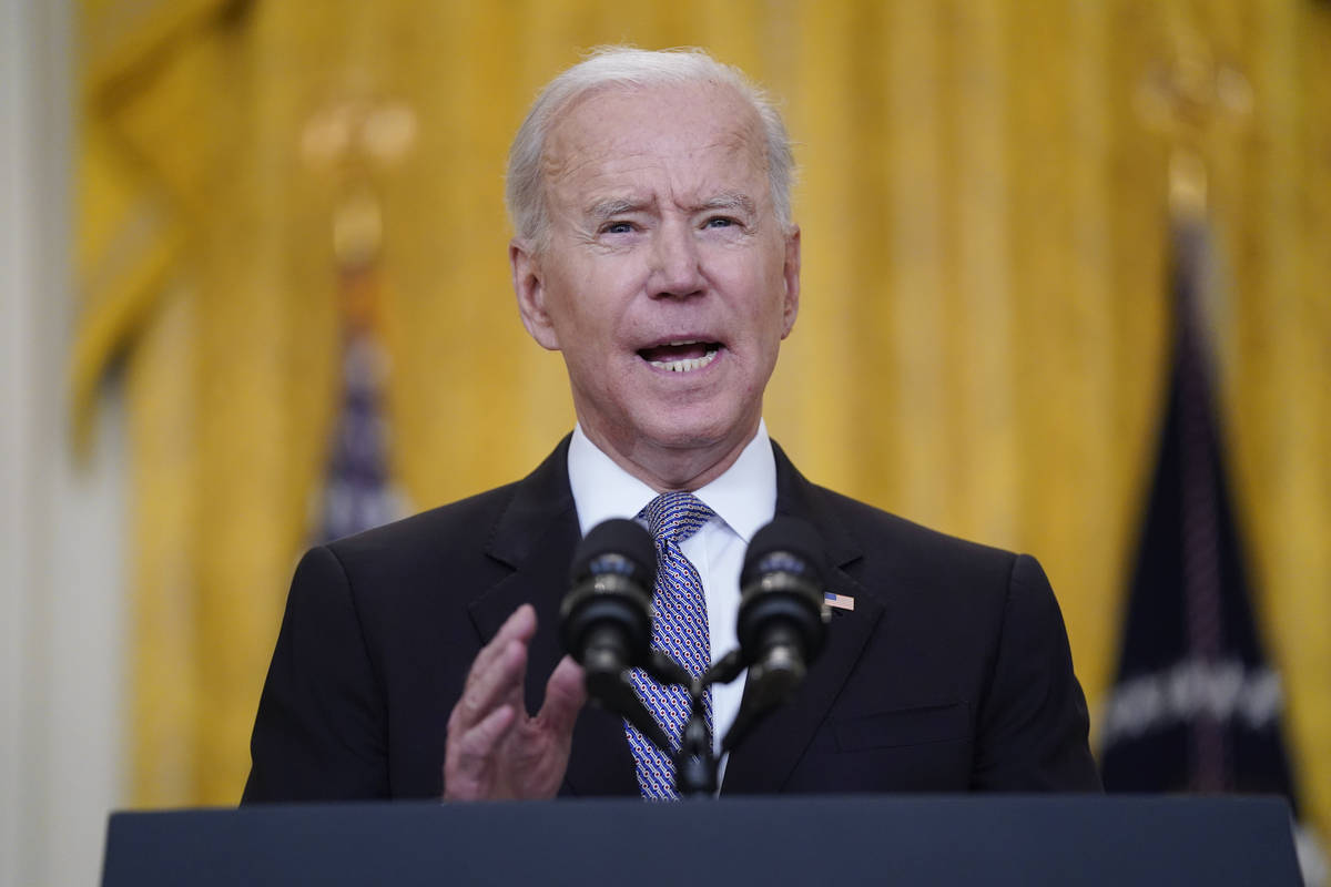 President Joe Biden speaks about distribution of COVID-19 vaccines, in the East Room of the Whi ...