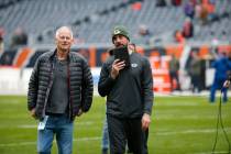 Green Bay Packers' Aaron Rodgers, talk to ESPN's Kenny Mayne before an NFL game against the Chi ...