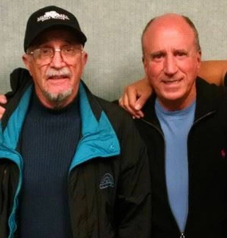 Retired Marine Peter "Chris" Christoff poses for a picture with his longtime friend Steve Mille ...
