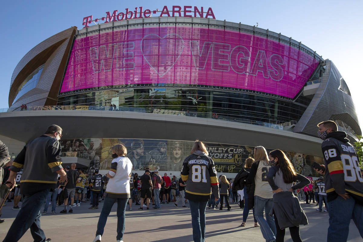 Fans roam before an NHL playoff game between the Golden Knights and the Wild at T-Mobile Arena ...