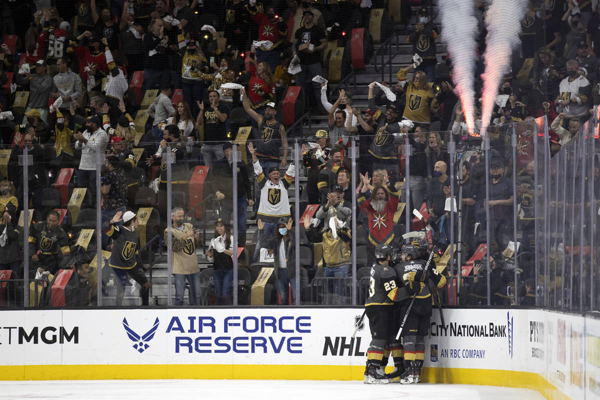 The Golden Knights celebrate a goal scored by right wing Alex Tuch (89) during the second perio ...