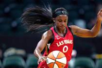 Las Vegas Aces' Jackie Young in action against the Seattle Storm during a WNBA basketball game ...