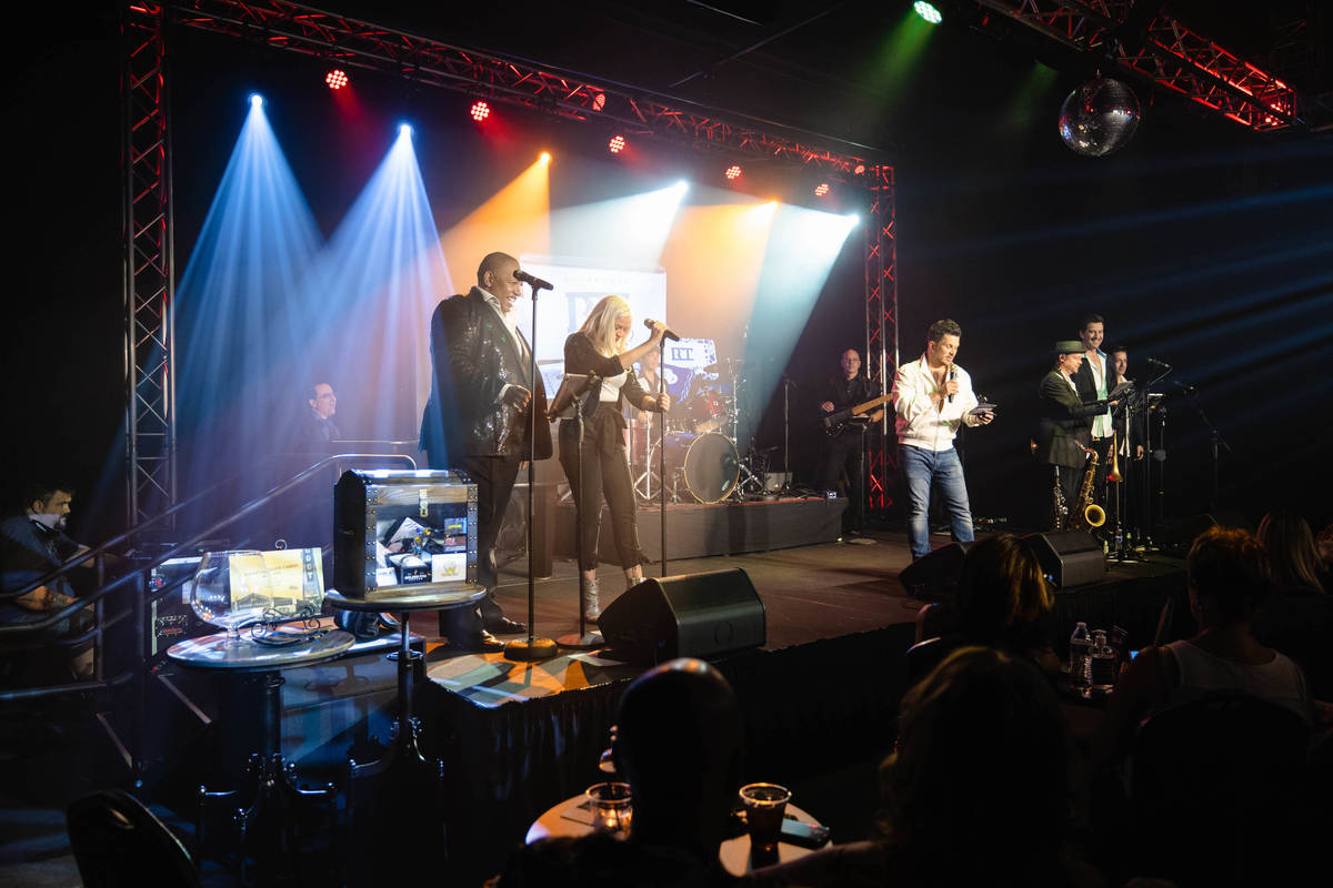 The Space owner Mark Shunock and the backing band are shown at Mondays Dark's benefit for Unsha ...