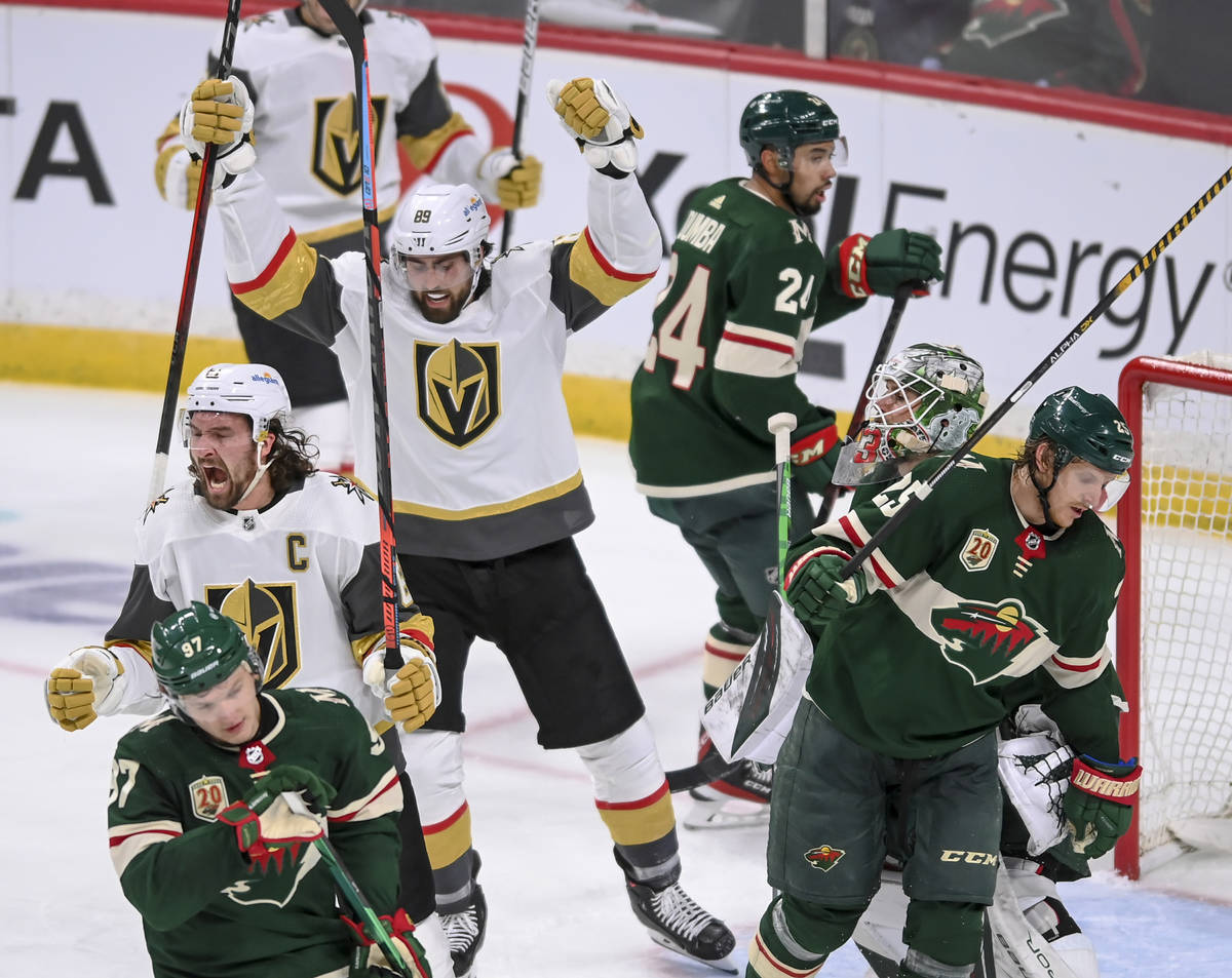 Vegas Golden Knights right wing Mark Stone (61) celebrates after scoring against the Minnesota ...