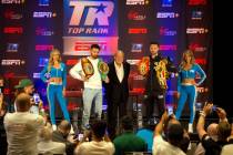 WBC and WBO junior welterweight champion Jose Ramirez, second from left, Top Rank promoter Bob ...