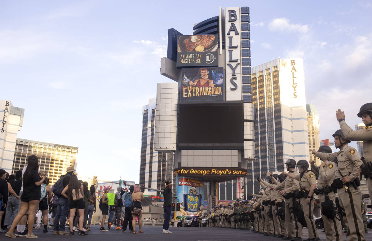 Police and George Floyd protesters standoff at the intersection of Flamingo and Las Vegas Boule ...
