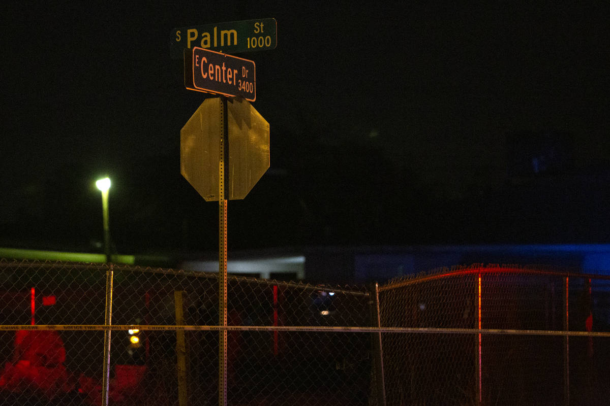 Metropolitan police investigate a homicide on the 3400 block of Center Drive, near East Charles ...
