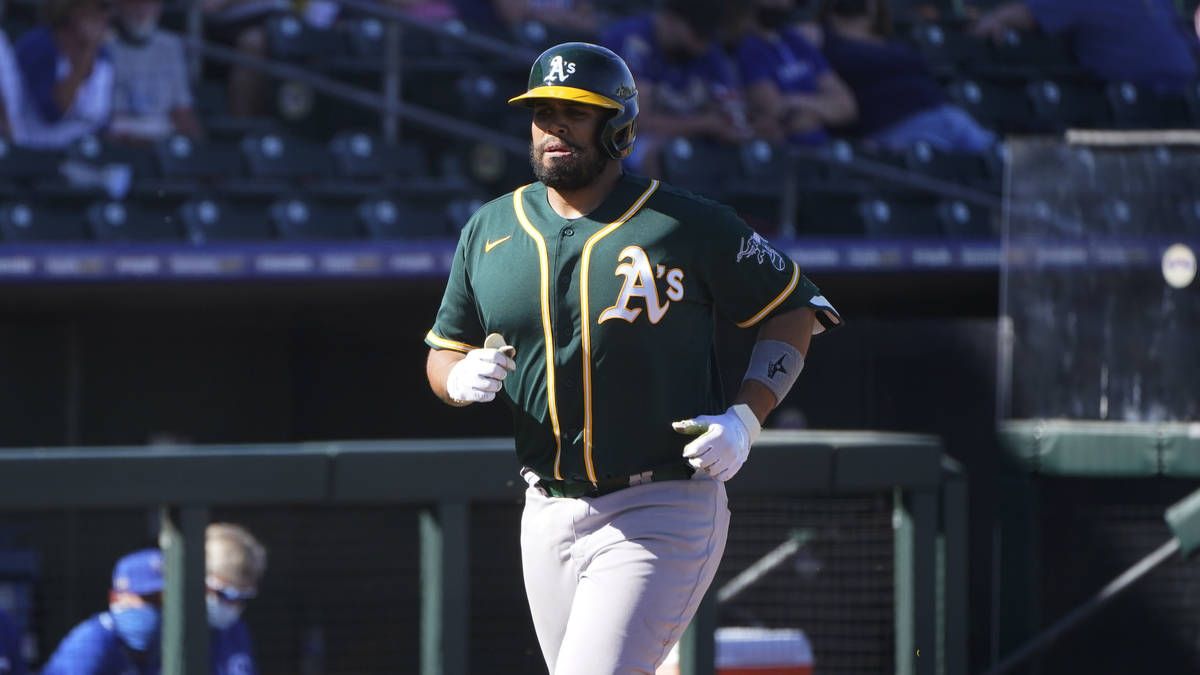 Oakland Athletics' Francisco Pena runs to home plate with a home run in the sixth inning of a s ...