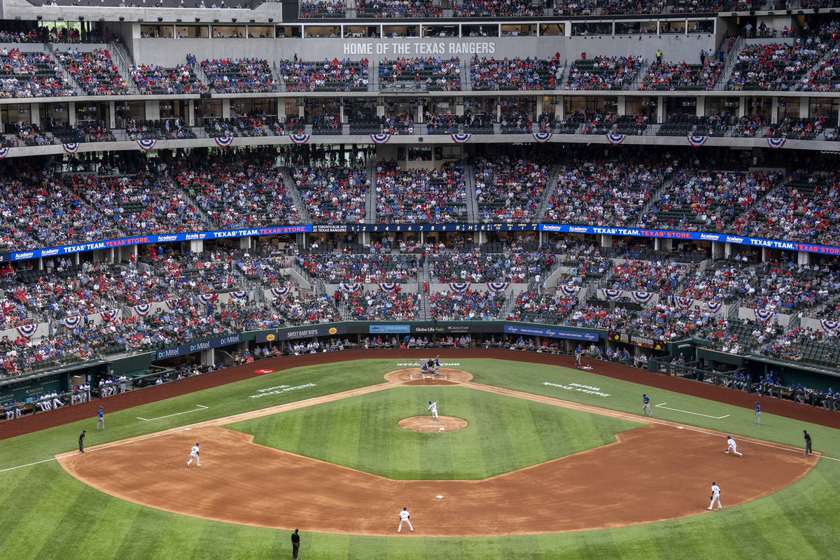 Fans fill the stands at Globe Life Field during the second inning of a baseball game between th ...